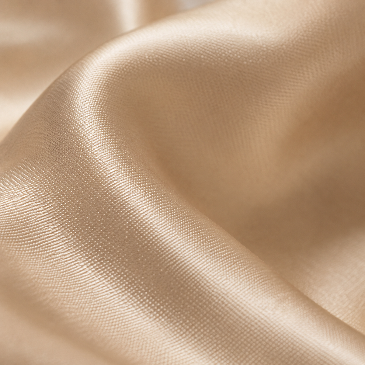 Macro close-up of the 22 momme champagne silk weave